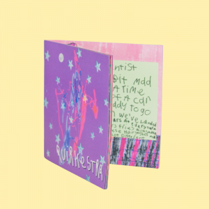 The Outta This Quirky World booklet partially open by Quirkestra.