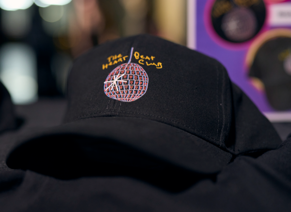 black cap with Heart Beat Club logo