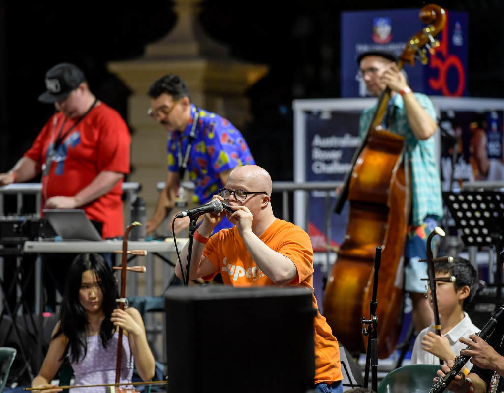 Tutti musicians performing at Floods of Fire