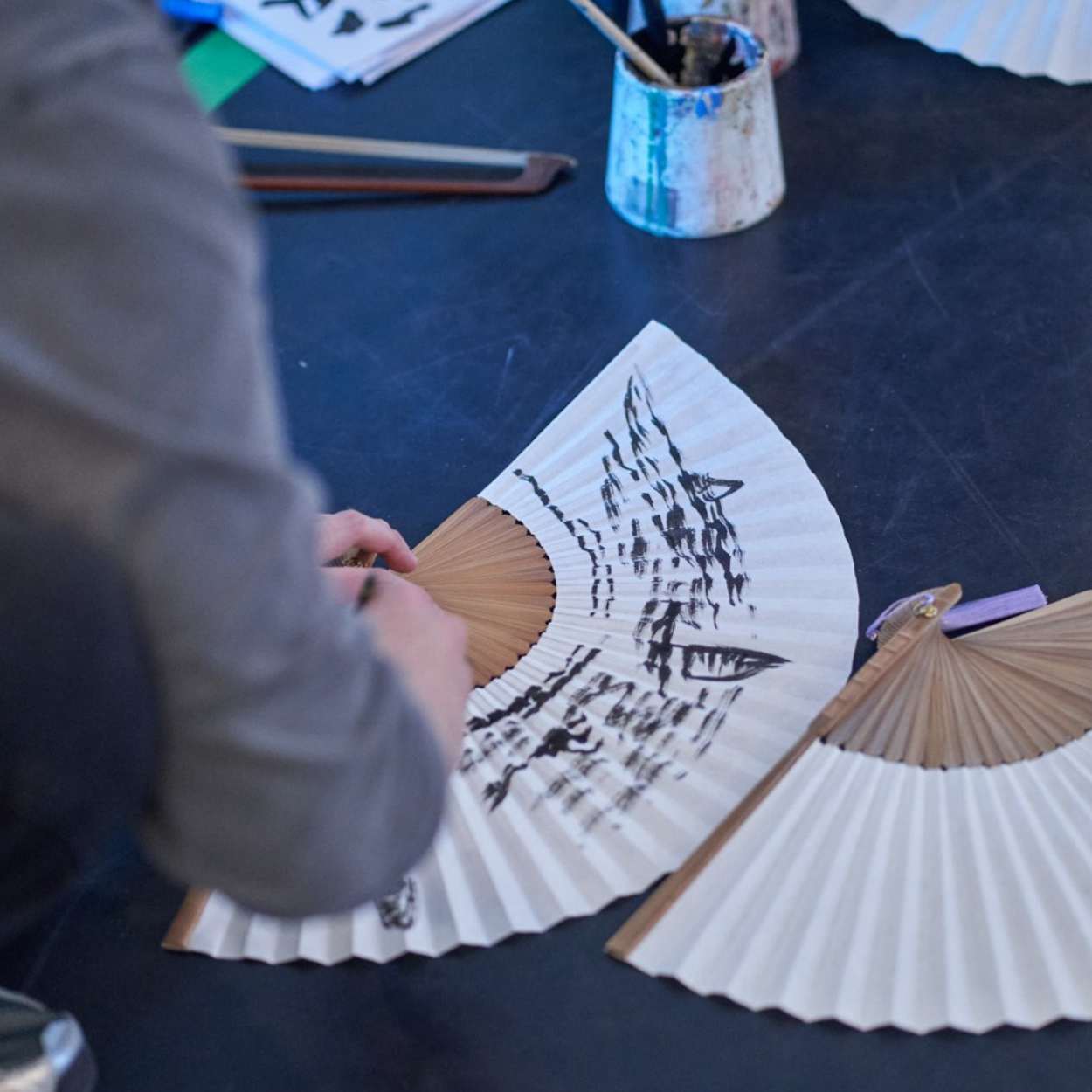 Fan painting at Deudgi exhibition - Brighton.