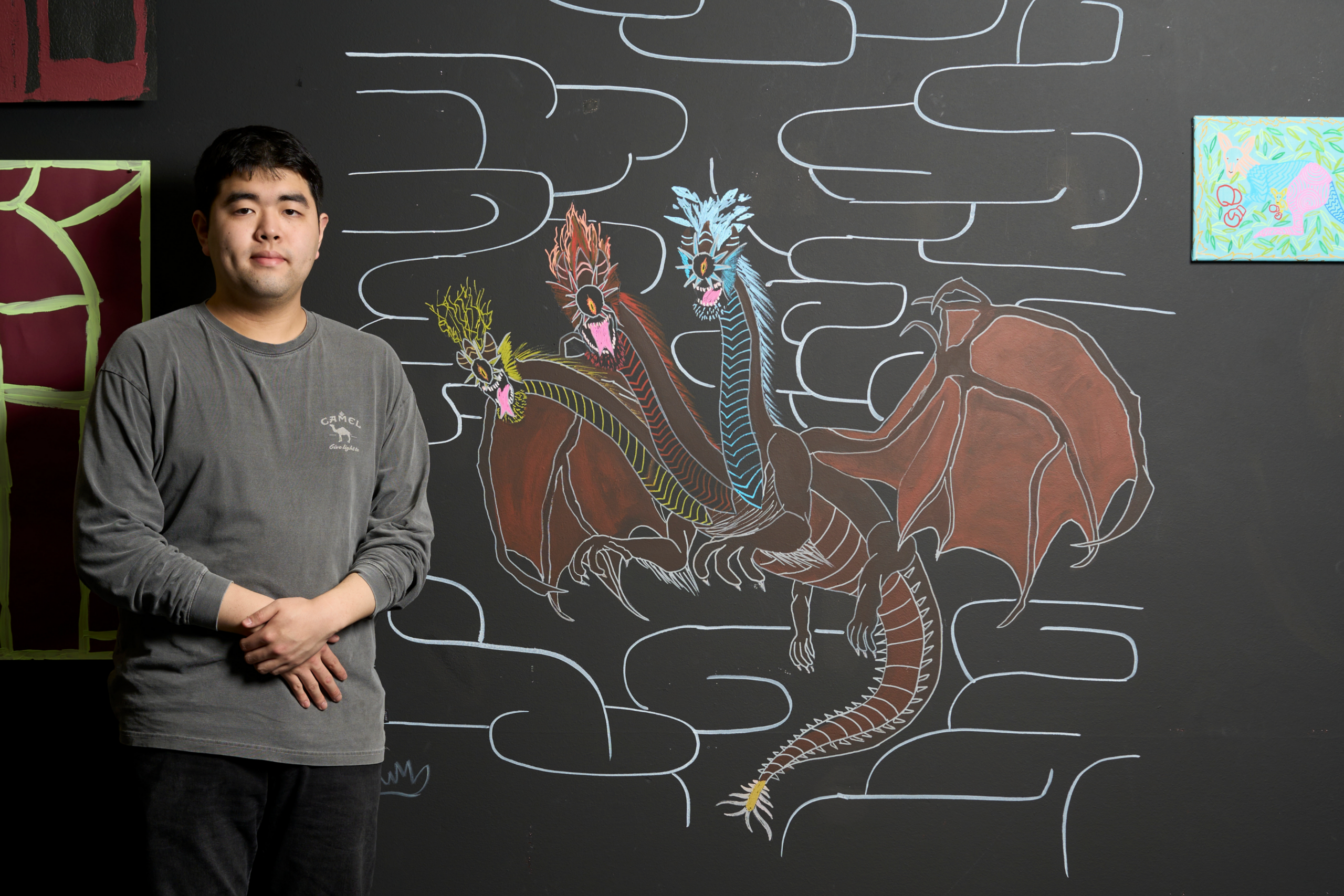 Euihyun with his art, made on exchange in Korea.