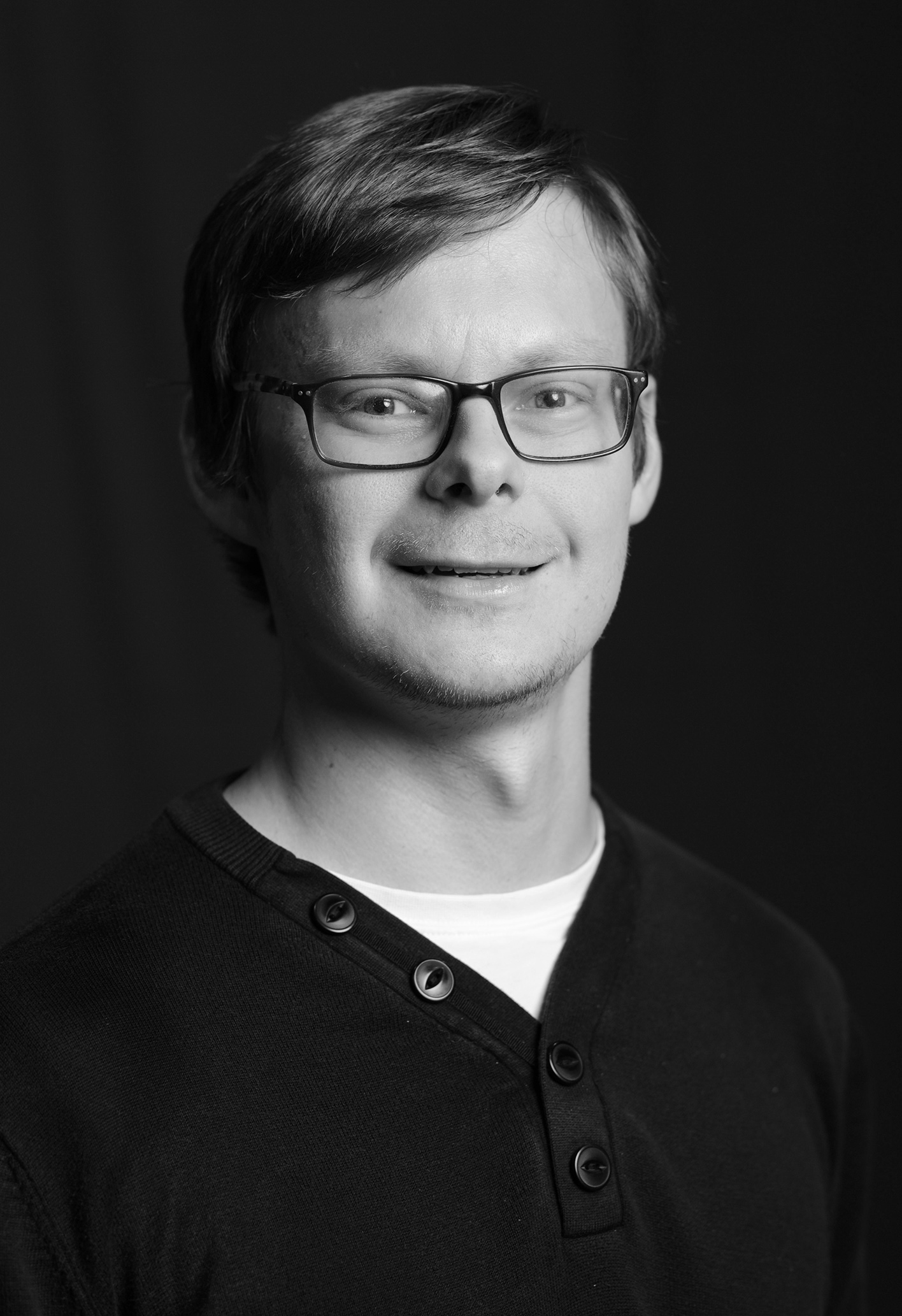 Black and white headshot of Andy. 