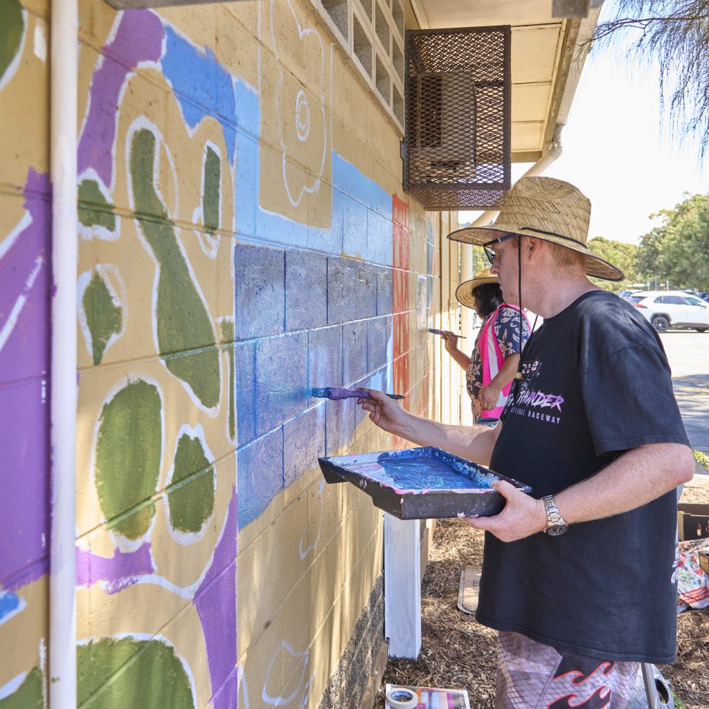 Nathan Smith painting the signal hut.