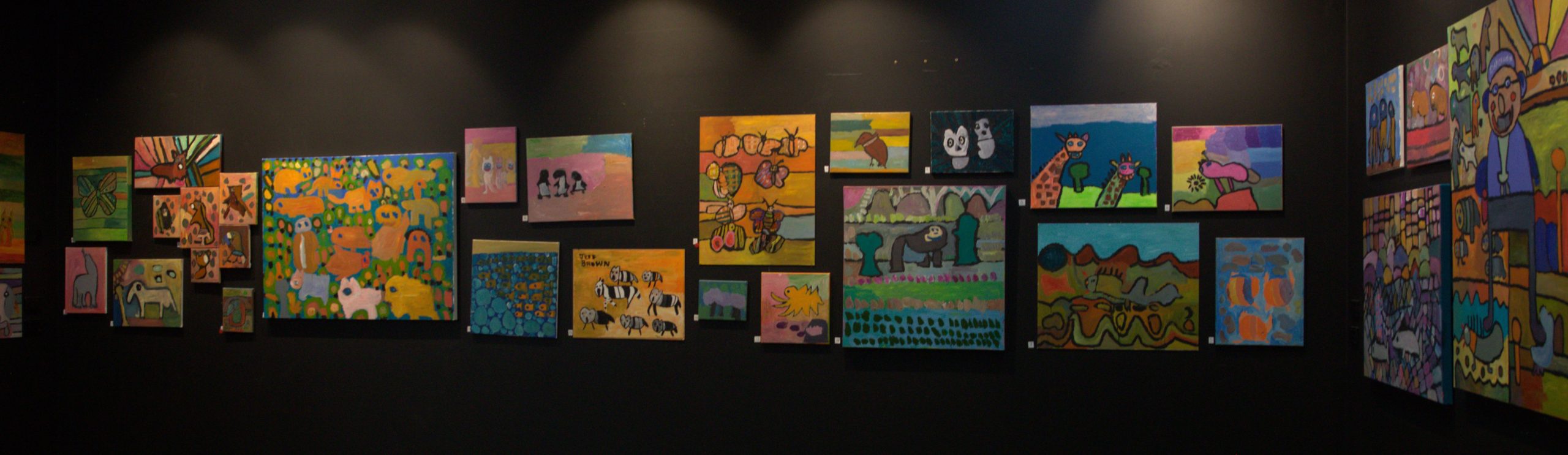 Jeffrey's artwork hung on the wall. 